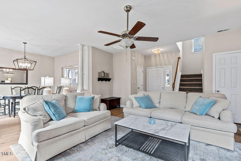 112 Oxpens Road Cary, NC 27513 - Photo 7 of 37 a living room with furniture and a wooden floor