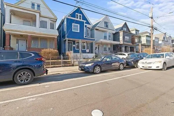 a car parked in front of a building