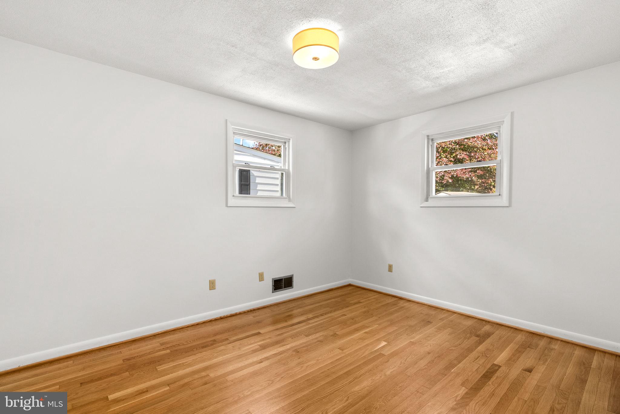 8700 50th Place College Park, MD 20740 - Photo 13 of 33 a view of a room with a fan