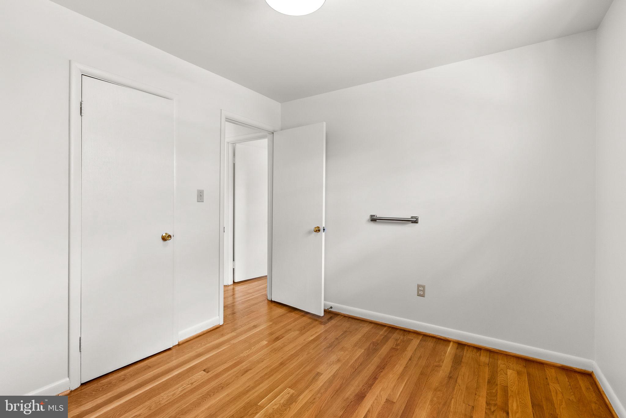 8700 50th Place College Park, MD 20740 - Photo 17 of 33 a view of room with wooden floor