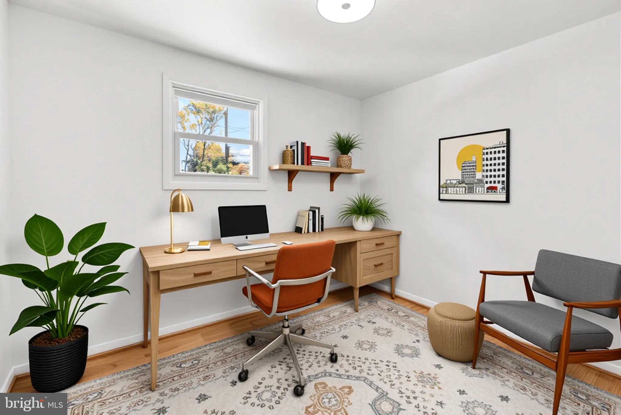 8700 50th Place College Park, MD 20740 - Photo 18 of 33 a work room with furniture and a potted plant