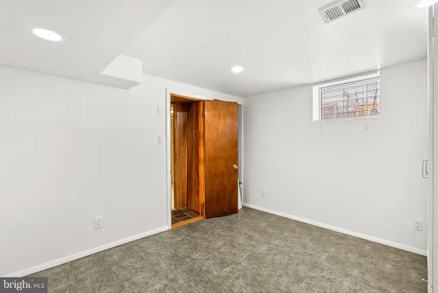 an empty room with window