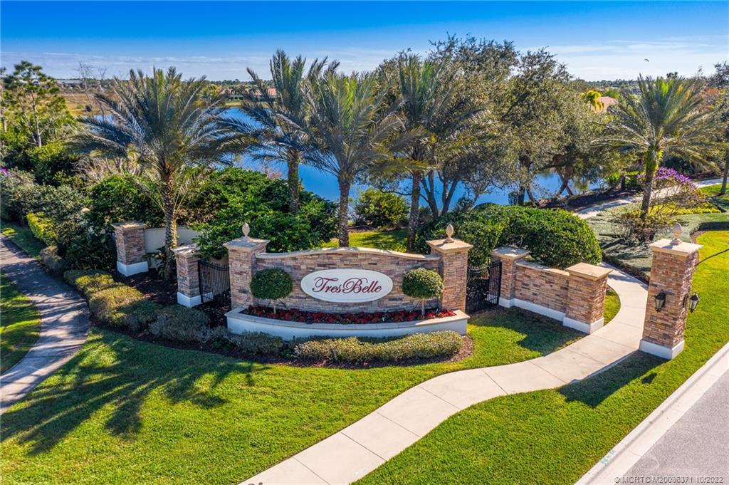 7426 Southeast Laque Circle Stuart, FL 34997 - Photo 10 of 81 a view of a house with backyard outdoor seating and entertaining space