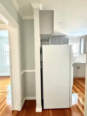 a view of kitchen with wooden floor