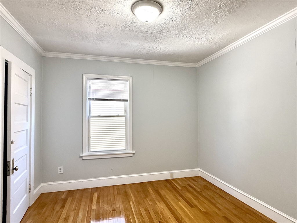 19-21 Dearborn Avenue, Unit 2 Lynn, MA 01905 - Photo 17 of 20 an empty room with windows