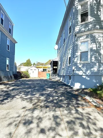 a view of a street with big building