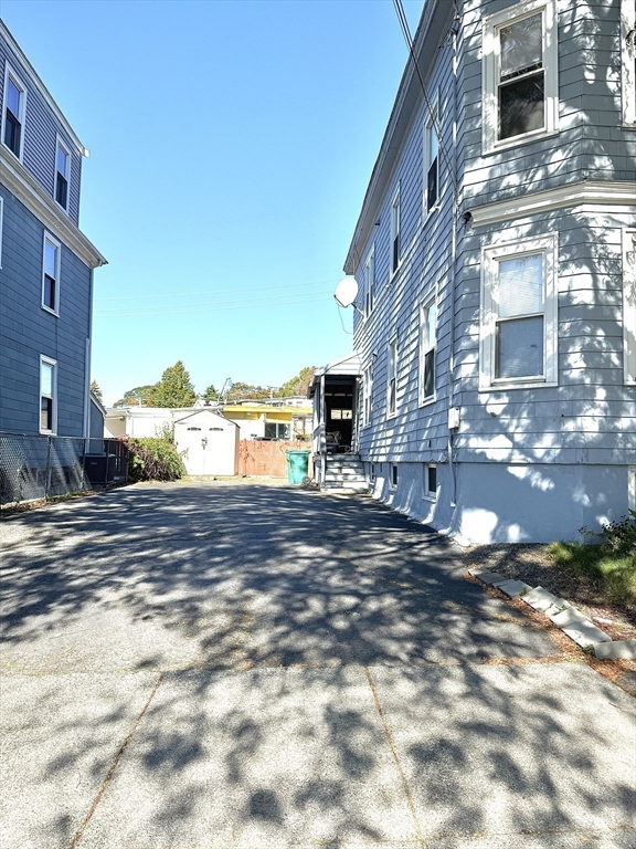 19-21 Dearborn Avenue, Unit 2 Lynn, MA 01905 - Photo 3 of 20 a view of a street with big building