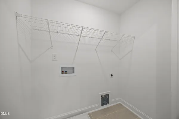 a view of a room with racks on the wall