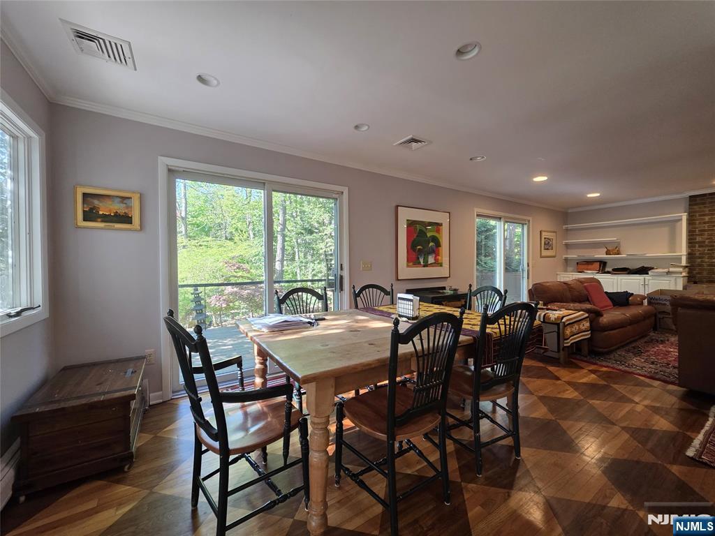 33 Cedar Lane Closter, NJ 07624 - Photo 19 of 44 a view of a dining room with furniture window and outside view