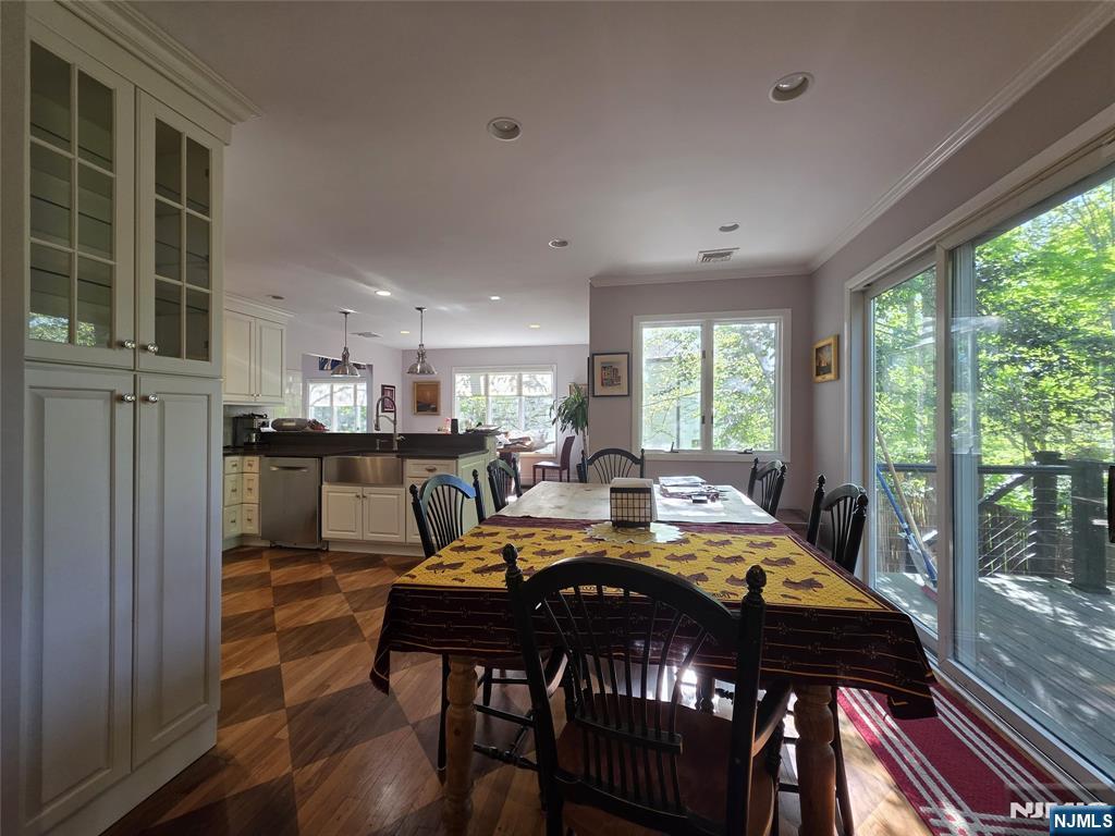 33 Cedar Lane Closter, NJ 07624 - Photo 20 of 44 a view of a dining room with furniture window and outside view