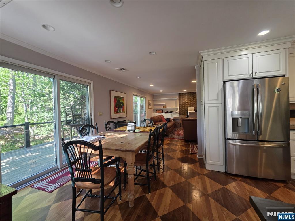 33 Cedar Lane Closter, NJ 07624 - Photo 22 of 44 a view of a dining room with furniture window and outside view