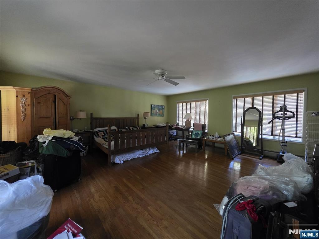 33 Cedar Lane Closter, NJ 07624 - Photo 29 of 44 a living room with furniture and a large window