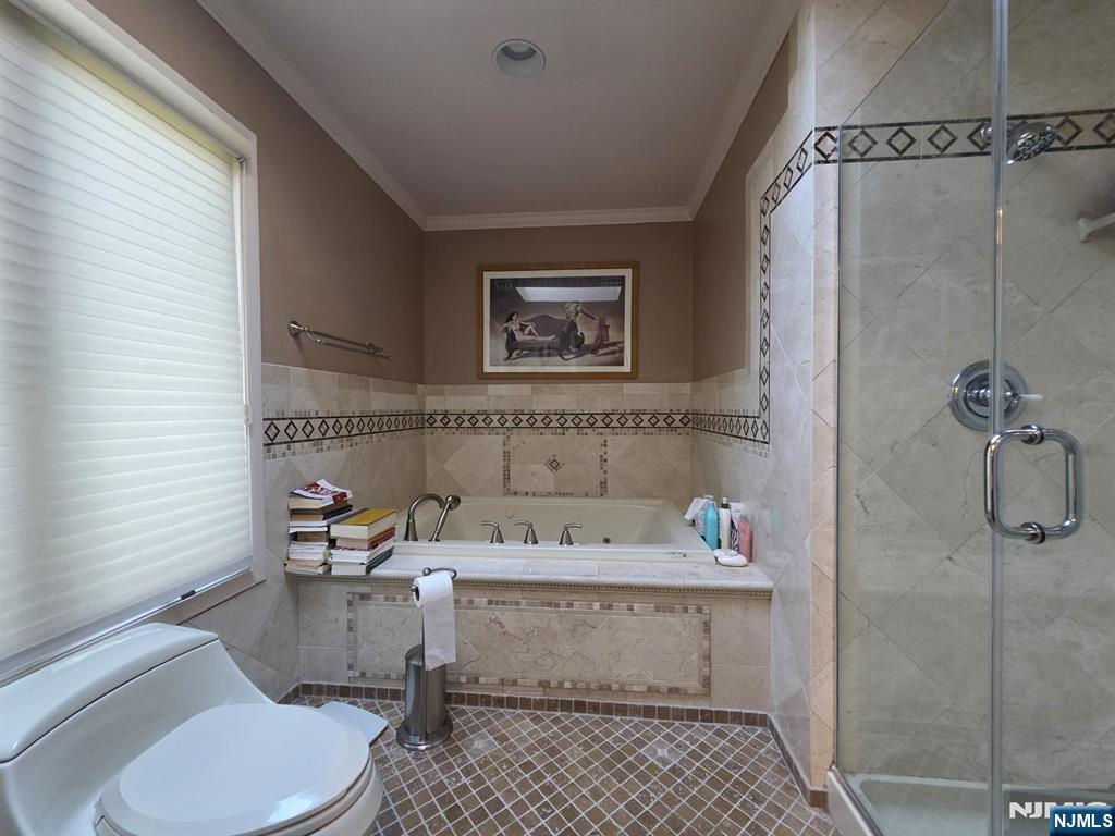 33 Cedar Lane Closter, NJ 07624 - Photo 31 of 44 a bathroom with a sink toilet and shower