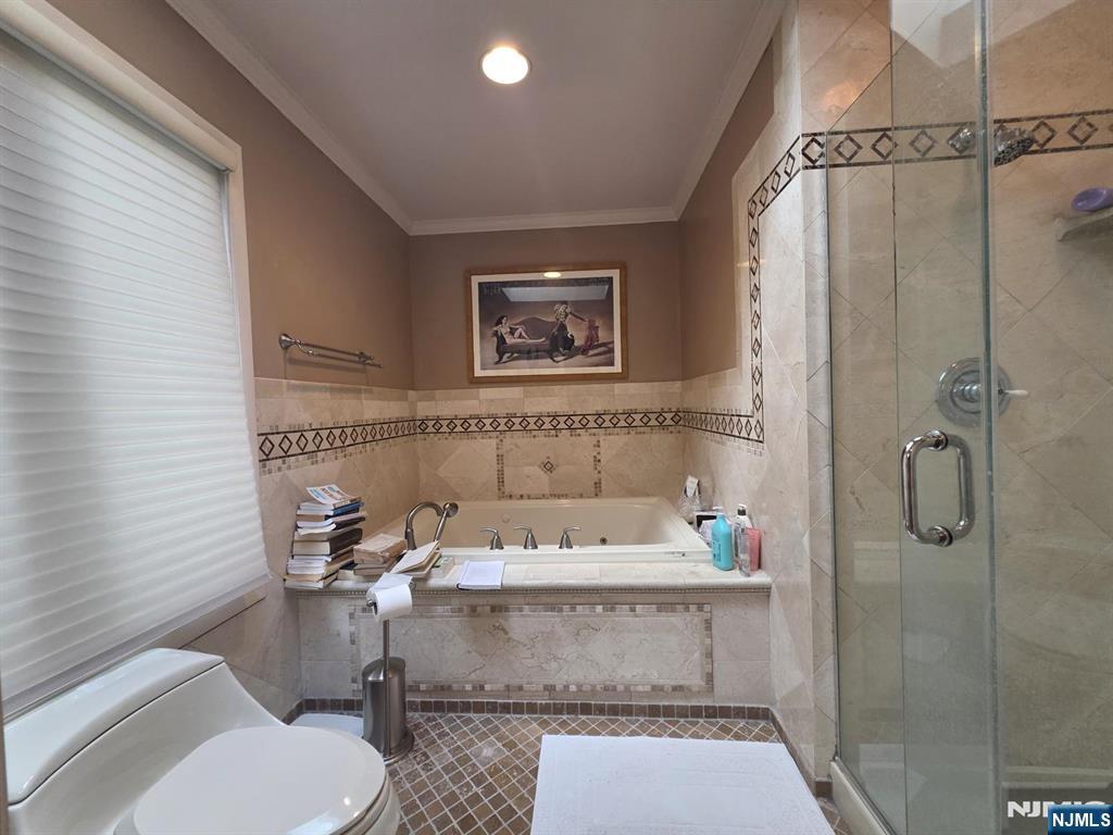 33 Cedar Lane Closter, NJ 07624 - Photo 33 of 44 a bathroom with a sink toilet and shower