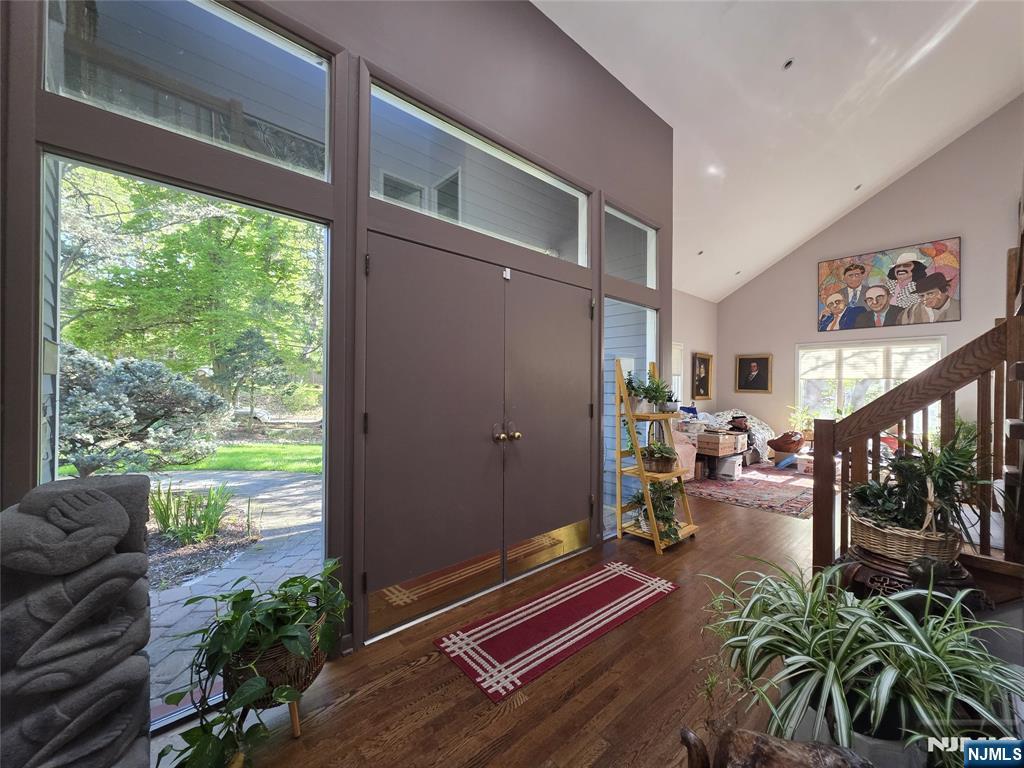 33 Cedar Lane Closter, NJ 07624 - Photo 42 of 44 a living room with patio furniture and a potted plant