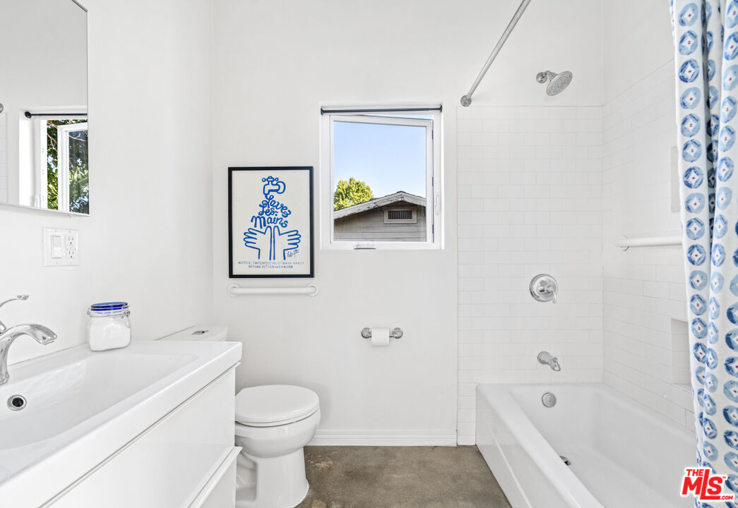 2275 Ewing Street Los Angeles, CA 90039 - Photo 12 of 19 a bathroom with a sink a toilet and shower