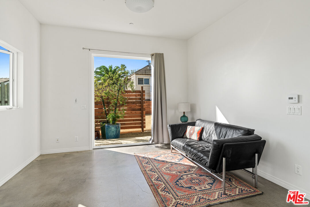 2275 Ewing Street Los Angeles, CA 90039 - Photo 6 of 19 a living room with furniture and a window