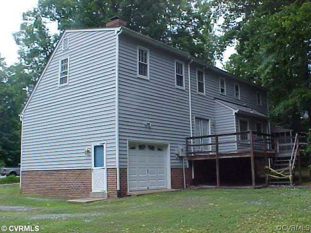 705 Fennimore Road Midlothian, VA 23114 - Photo 2 of 7 a front view of a house with a garden