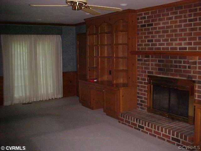 705 Fennimore Road Midlothian, VA 23114 - Photo 4 of 7 a view of a fireplace
