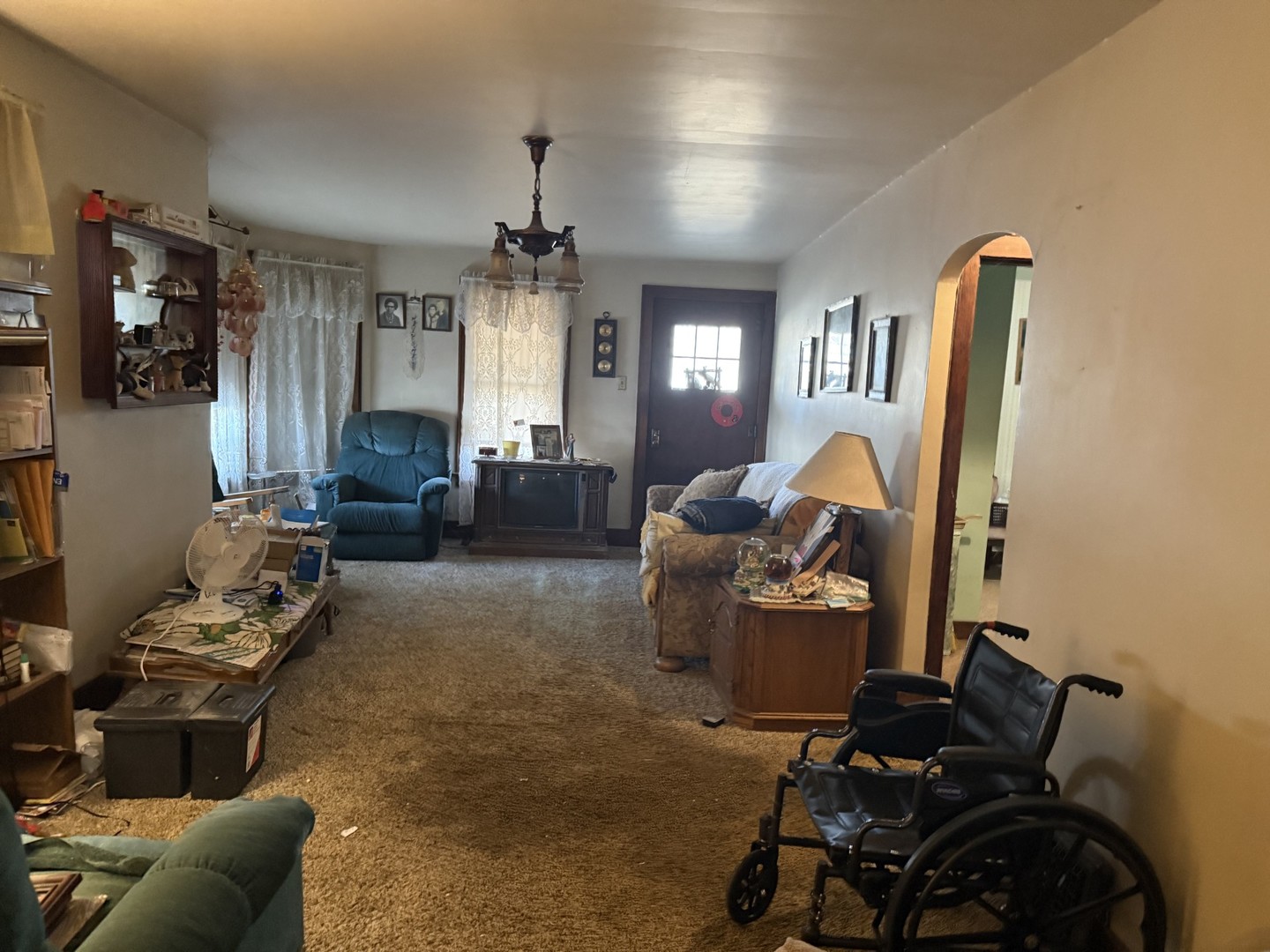 131 West Erie Street Spring Valley, IL 61362 - Photo 8 of 20 a living room with furniture and a window