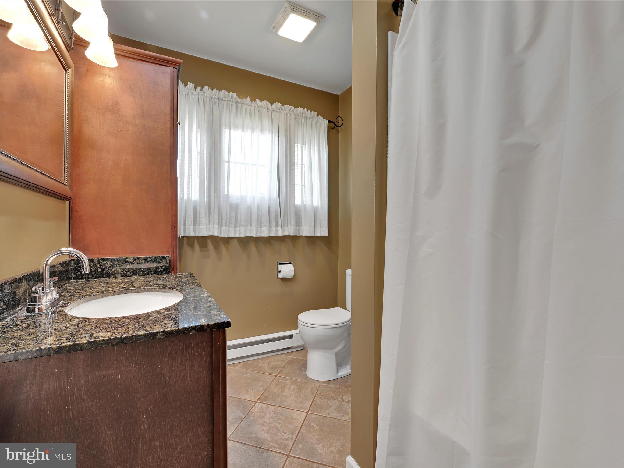 407 Vaughn Road Royersford, PA 19468 - Photo 16 of 32 Renovated Bathroom is fresh and cheery