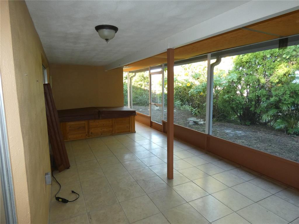 4832 Elmwood Street New Port Richey, FL 34653 - Photo 18 of 24 a view of a room with window