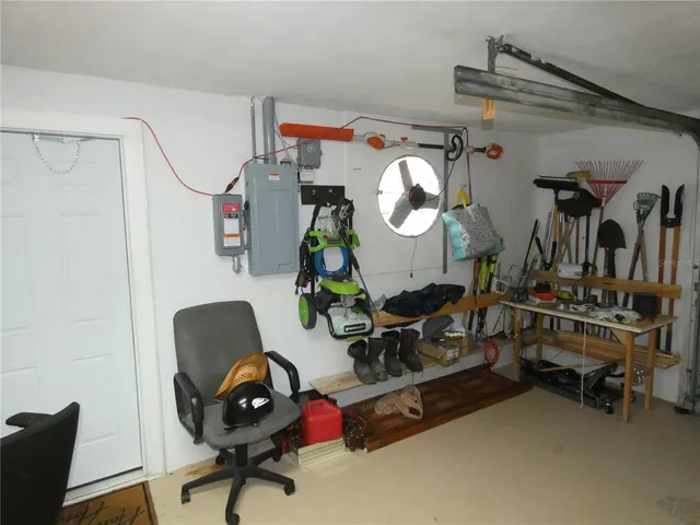 a room with gym equipment and a mirror