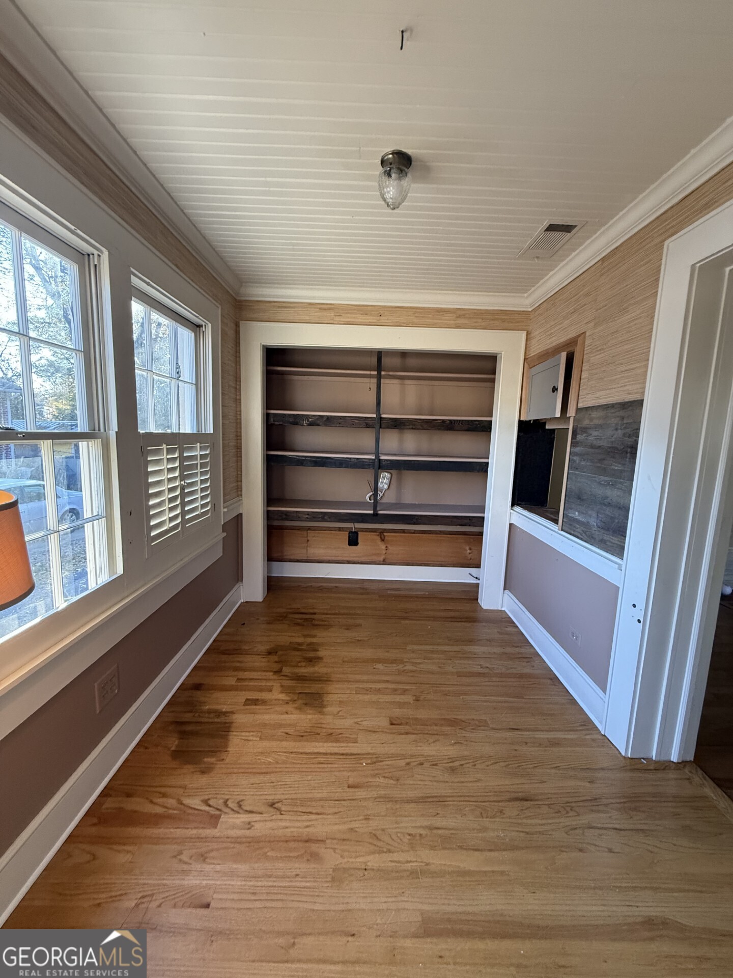 952 Wayside Street Northwest Cornelia, GA 30531 - Photo 16 of 50 a view of walk in closet with empty racks