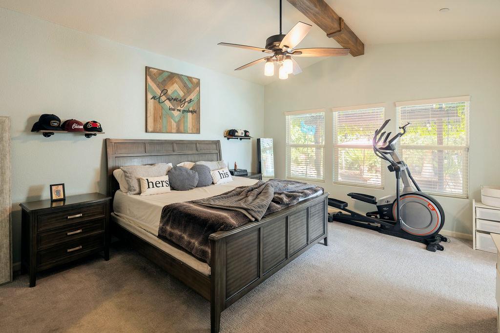 602 South Filbert Avenue Fresno, CA 93727 - Photo 30 of 50 a bedroom with a bed and a chandelier