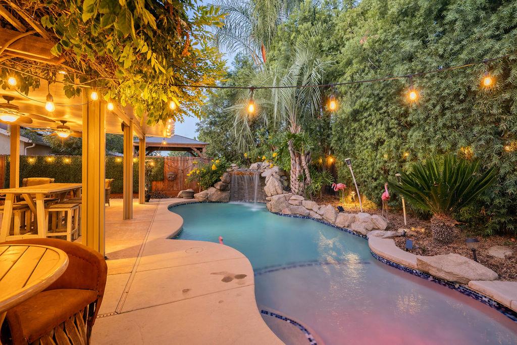 602 South Filbert Avenue Fresno, CA 93727 - Photo 42 of 50 a backyard of a house with yard and outdoor seating