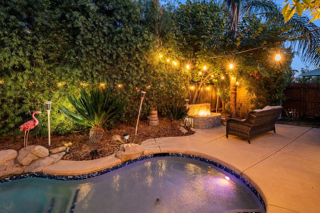 602 South Filbert Avenue Fresno, CA 93727 - Photo 45 of 50 a view of a swimming pool with some plants and trees