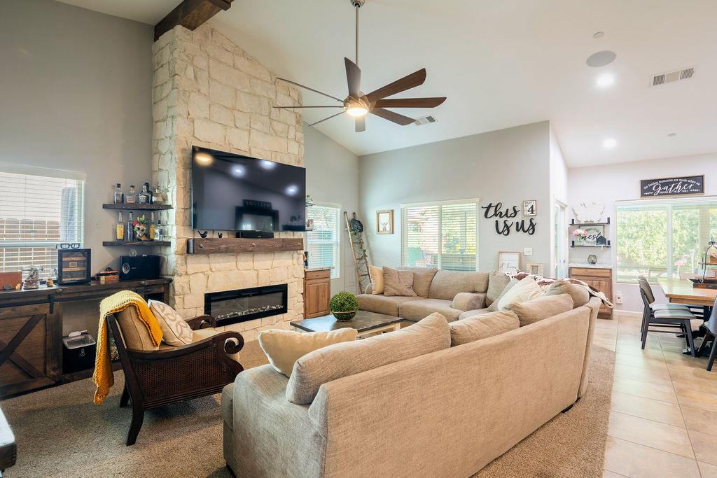 602 South Filbert Avenue Fresno, CA 93727 - Photo 5 of 50 a living room with fireplace furniture and a flat screen tv