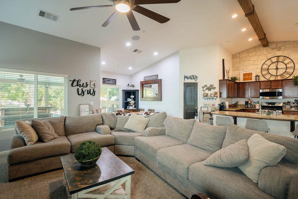 602 South Filbert Avenue Fresno, CA 93727 - Photo 8 of 50 a living room with furniture kitchen view and a large window