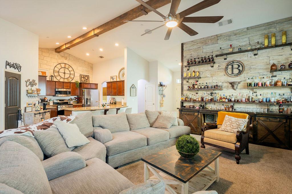 602 South Filbert Avenue Fresno, CA 93727 - Photo 9 of 50 a living room with furniture and a view of kitchen