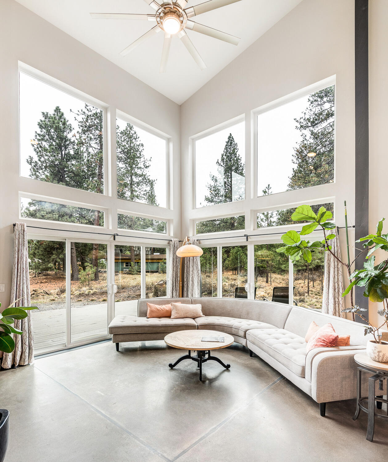 19354 Kiowa Road Bend, OR 97702 - Photo 8 of 37 a living room with furniture and a large window