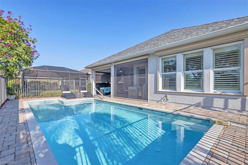 16424 Windsor Way Alva, FL 33920 - Photo 30 of 48 a view of a house with swimming pool and sitting area