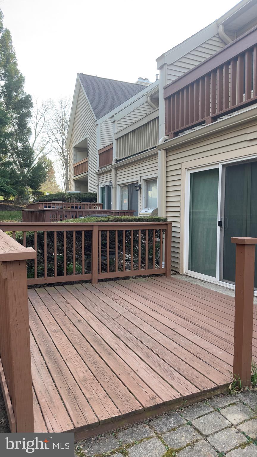 342 Brigade Court, Unit 342 Chesterbrook, PA 19087 - Photo 16 of 16 a view of a house with wooden deck