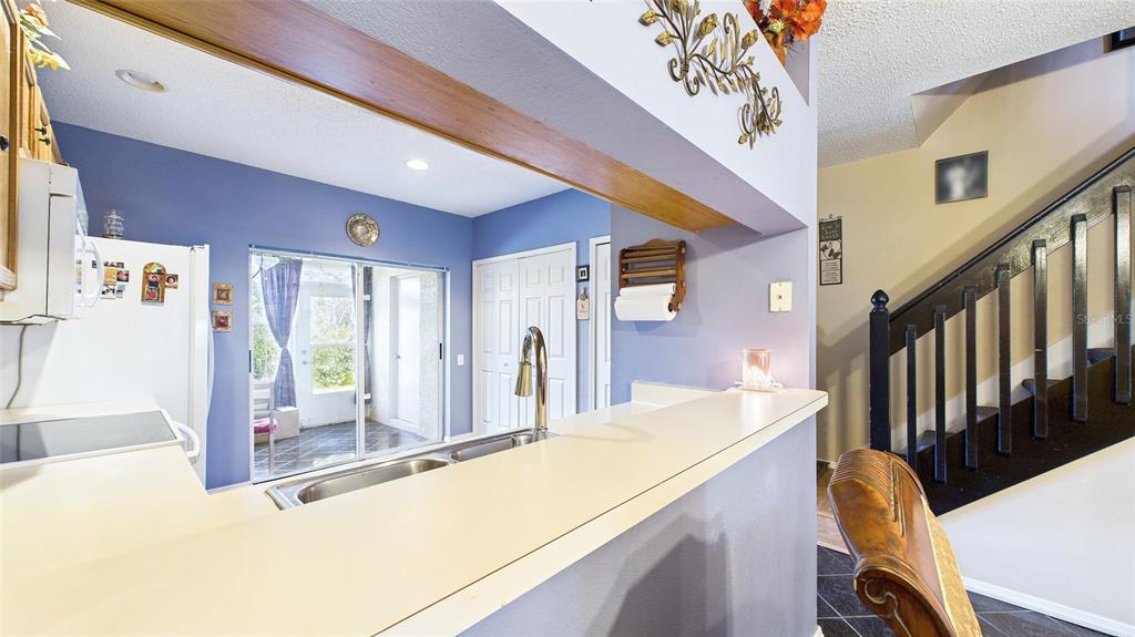 1250 Redondo Way Wesley Chapel, FL 33543 - Photo 12 of 27 a view of a living room with a large window