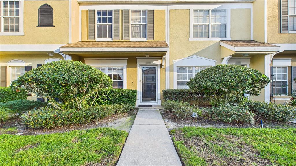 1250 Redondo Way Wesley Chapel, FL 33543 - Photo 2 of 27 front view of house with a yard