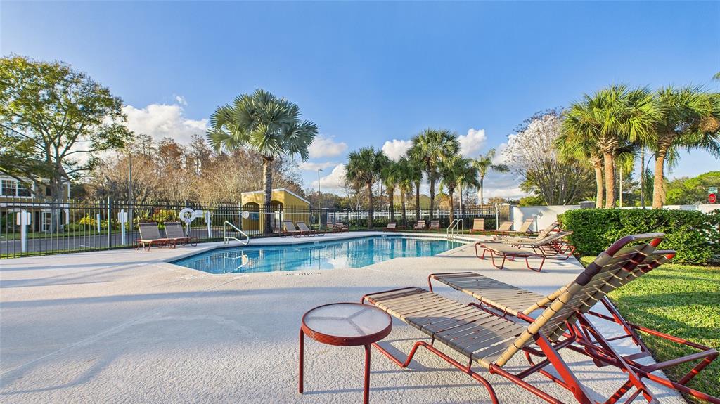 1250 Redondo Way Wesley Chapel, FL 33543 - Photo 4 of 27 a view of a swimming pool with lounge chairs