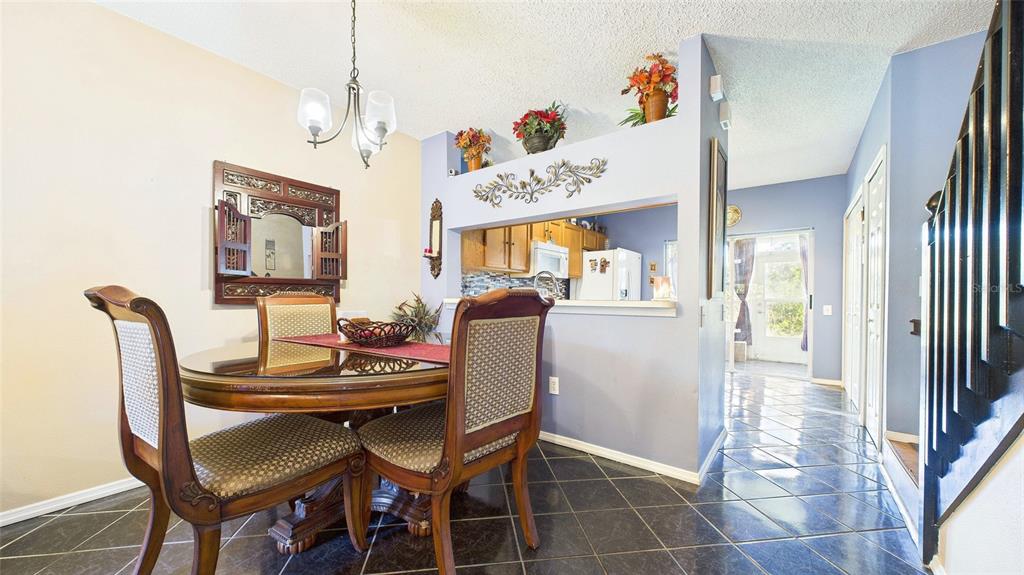 1250 Redondo Way Wesley Chapel, FL 33543 - Photo 6 of 27 a dining room with furniture and window