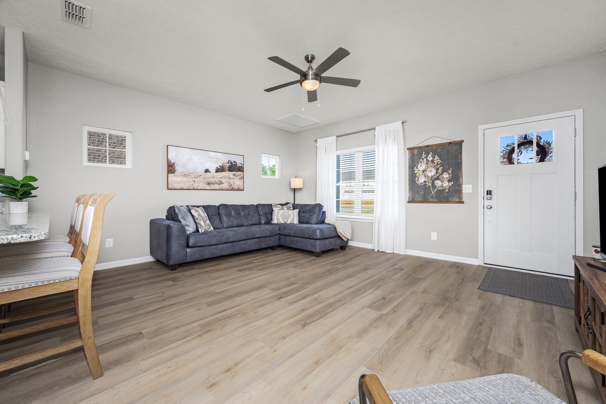 64 North Fork Branch Road Tullahoma, TN 37388 - Photo 12 of 49 a living room with furniture and a wooden floor