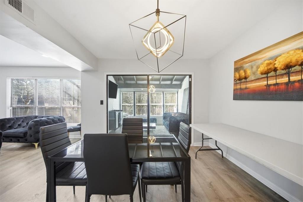 1039 Mariners Court Stone Mountain, GA 30083 - Photo 14 of 60 a view of a dining room with furniture window and outside view
