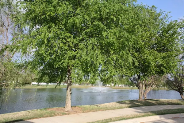 a view of a lake with houses