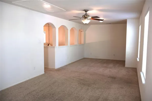 a view of a balcony with wooden floor