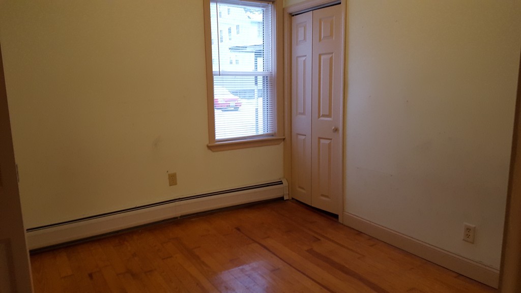 634 2nd Street Fall River, MA 02721 - Photo 5 of 12 an empty room with windows