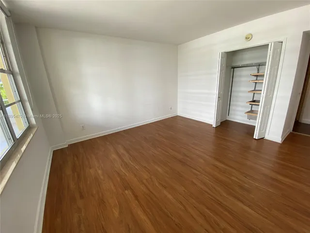 a bathroom with a sink and a washer dryer