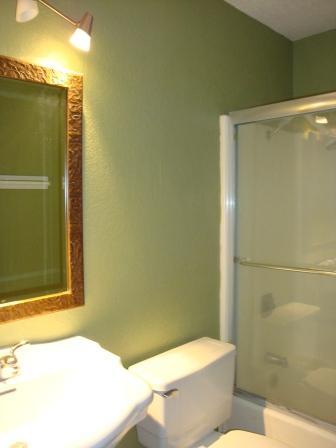 2857 North Los Felices Road, Unit 217 Palm Springs, CA 92262 - Photo 4 of 12 a bathroom with a toilet and a shower