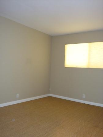 2857 North Los Felices Road, Unit 217 Palm Springs, CA 92262 - Photo 5 of 12 a view of an empty room and window