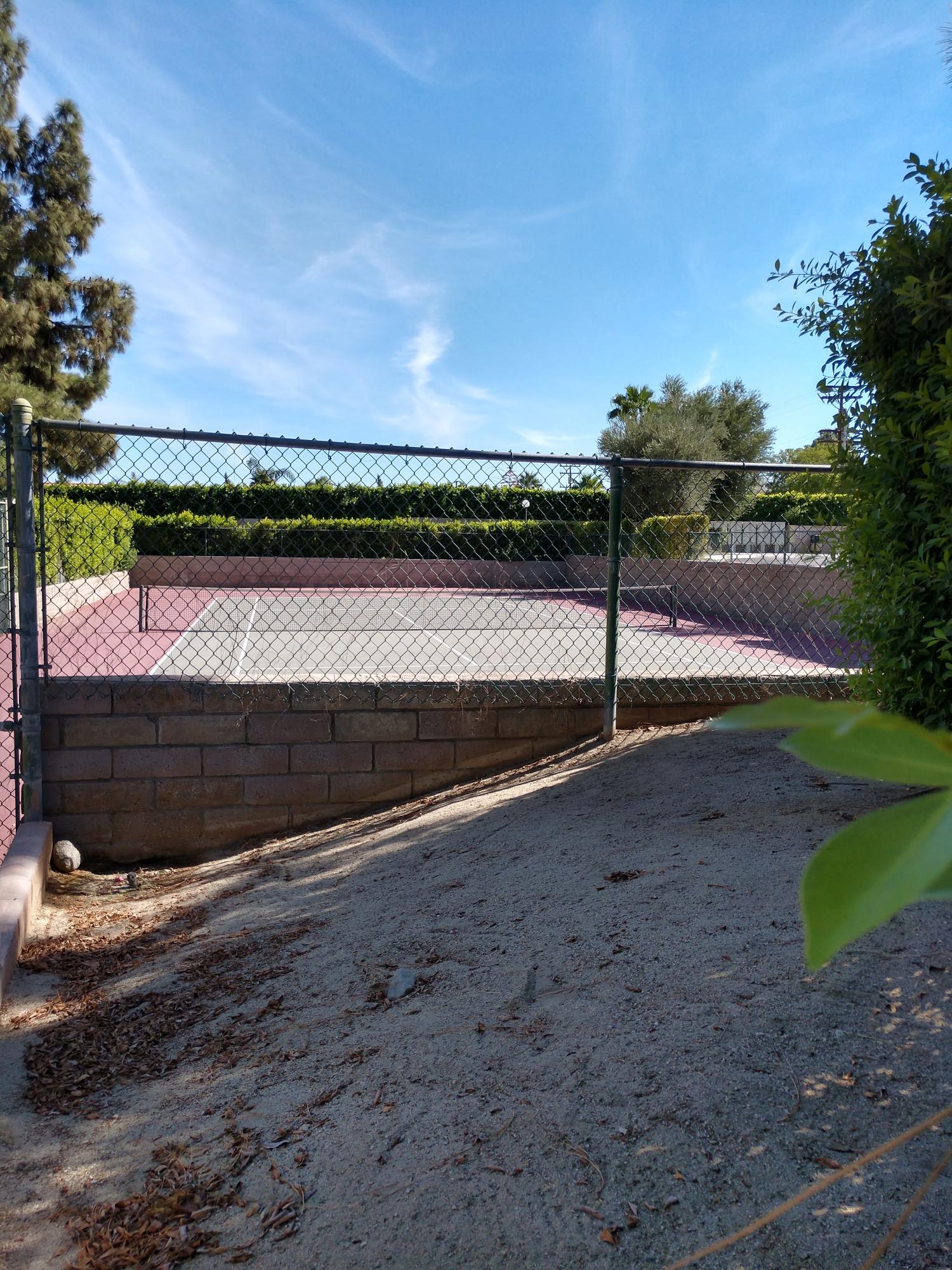 2857 North Los Felices Road, Unit 217 Palm Springs, CA 92262 - Photo 9 of 12 a view of a road with a building in the background
